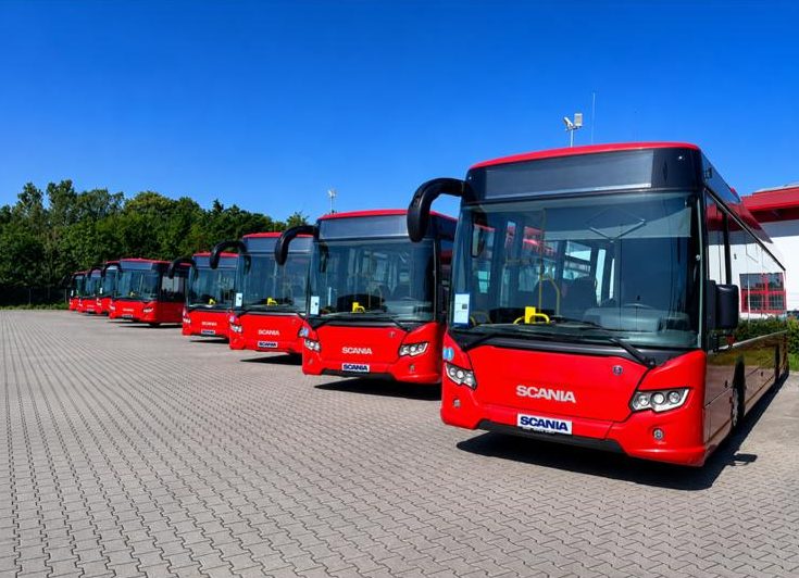 Fleet of red Scania Citywide city buses