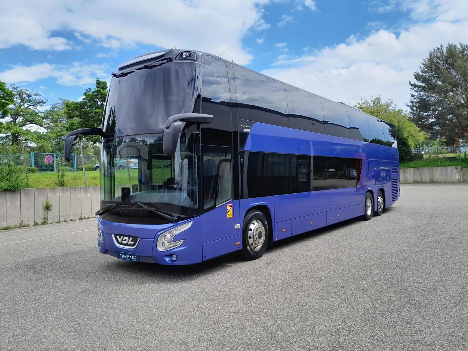 Blue VDL Futura double-decker coach